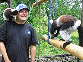 Jason Burns and a friendly lemur.