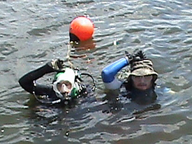 Courtney and Hans with their improvised jellyfish protection.