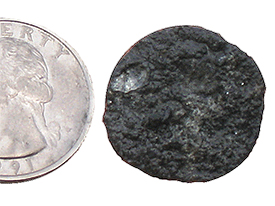 A sixteenth-century coin recovered by students working the in the southern stern unit. 
