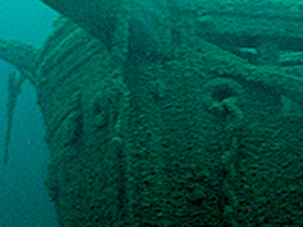 View showing missing chain in the starboard hawse pipe. 