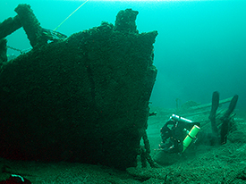 Diver recording the keel and deadwood at the base of the collapsed
bow.