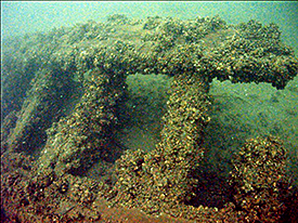 Wooden barge structure (Photo by David VanZandt / CLUE).