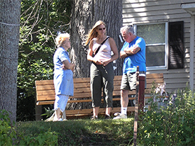 Jessi Halligan conducting a property-owner interview with the Hearnes.