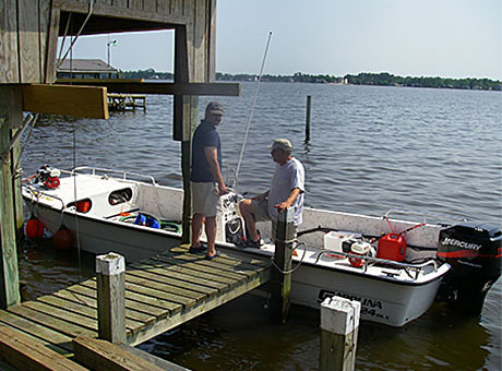 Calvin and Dr. Babits monitor Flounder: the  dredging headquarters for the Washington Park Site.
