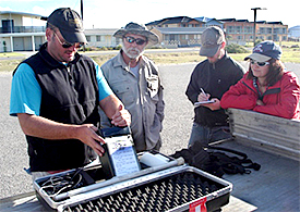 Ian Moffat setting up the magnetometer for team survey.