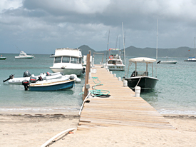 A view of the dock with the dive boat on left and St. Kitts in the distance.