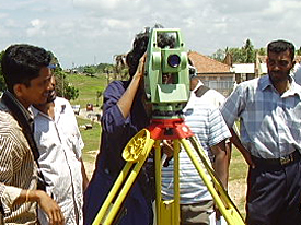 Nerina operating the Total Station.