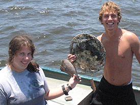 Erica Smith and Chris Dvorscak with their proud target dive finds.
