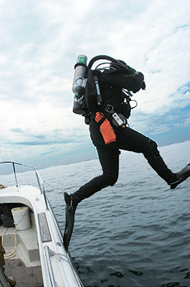 Striding into Lake Michigan.